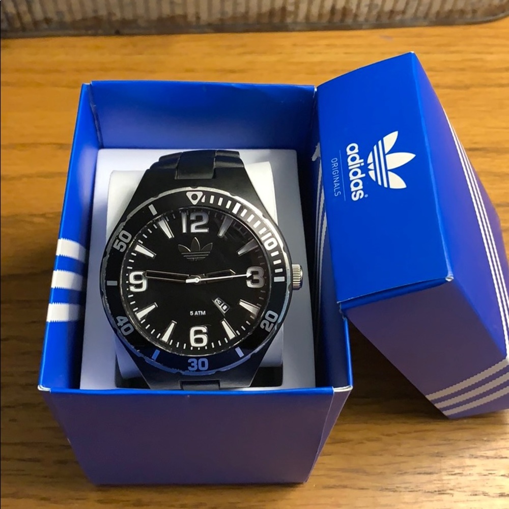Adidas watch with date window